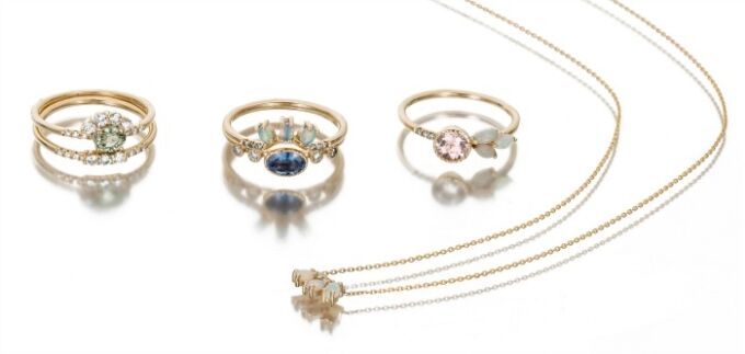 Jennie Kwon's tiny, beautiful jewels are perfect for stacking or layering. Rings and an opal necklace shown here.