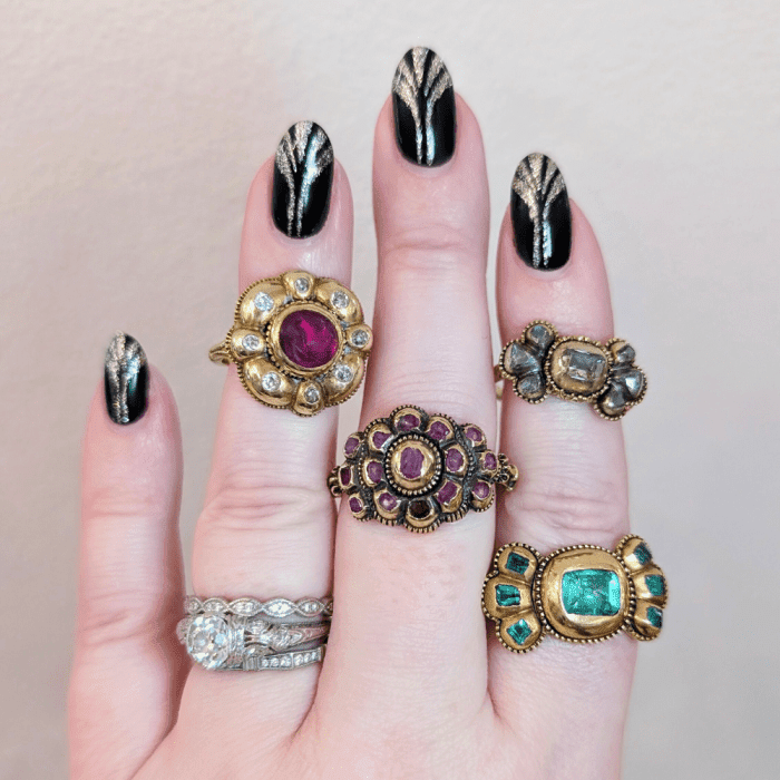 Antique Iberian rings from The Spare Room with emeralds, rubies, and diamonds. Seen at NYCJAOS.