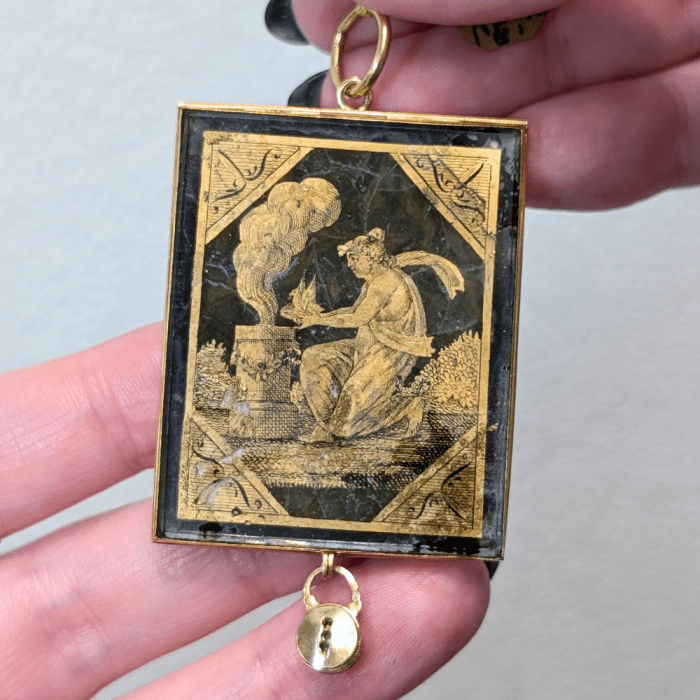 Georgian era jewel made using the French verre églomisé technique of gold on glass. From Marilyn & Co.