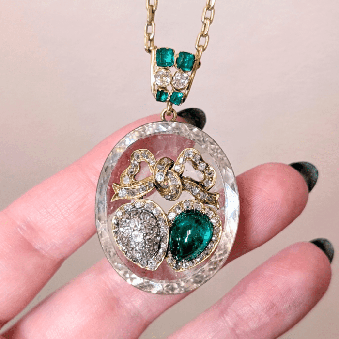 Victorian rock crystal twin heart necklace with emeralds and diamonds, from The Vintage Jeweller. Beautiful double heart!