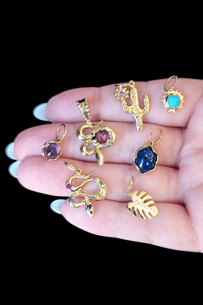 14K yellow gold Delphine Leymarie charms, from Beaumont Jewelry Collective.