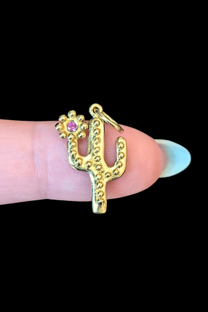Delphine Leymarie pink sapphire cactus charm in 14K yellow gold from Beaumont Jewelry Collective.
