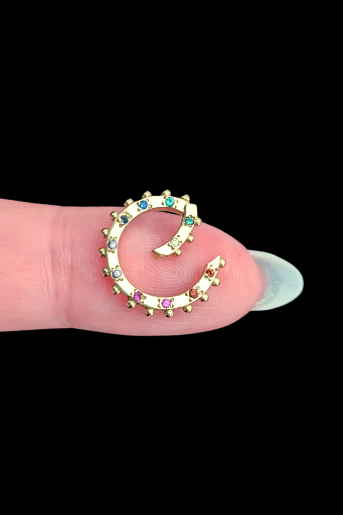Delphine Leymarie rainbow clicker charm holder connector in 14K yellow gold, open, from Beaumont Jewelry Collective