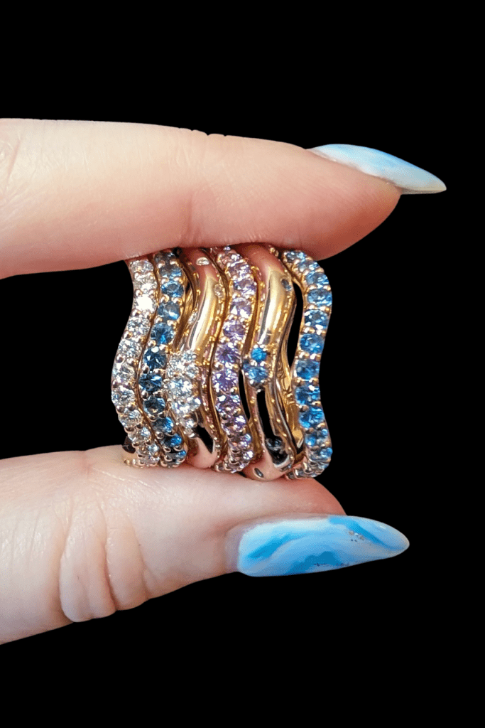 Dylann Wolfe gemstone stacking rings in Fairmined gold, from Beaumont Jewelry Collective