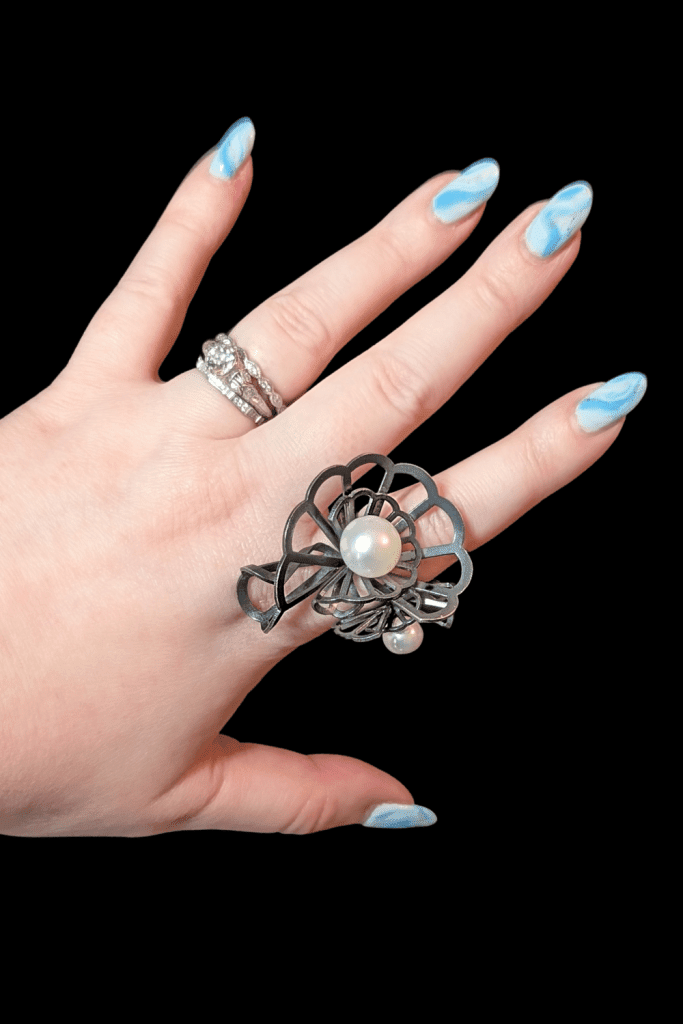 Karin Jacobson Double Origami Sculptural Pearl Ring from Beaumont Jewelry Collective, hand close up.