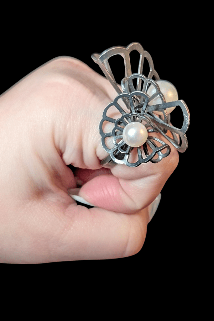 Karin Jacobson Double Origami Sculptural Pearl Ring from Beaumont Jewelry Collective, side view on hand.