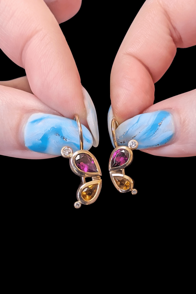 Karin Jacobson butterfly earrings with garnet, citrine and diamonds; from Beaumont Jewelry Collective.