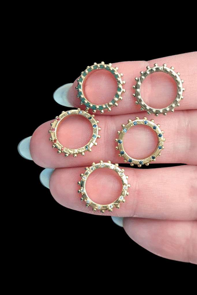 Delphine Leymarie clicker charm holder connectors in 14K yellow gold from Beaumont Jewelry Collective.