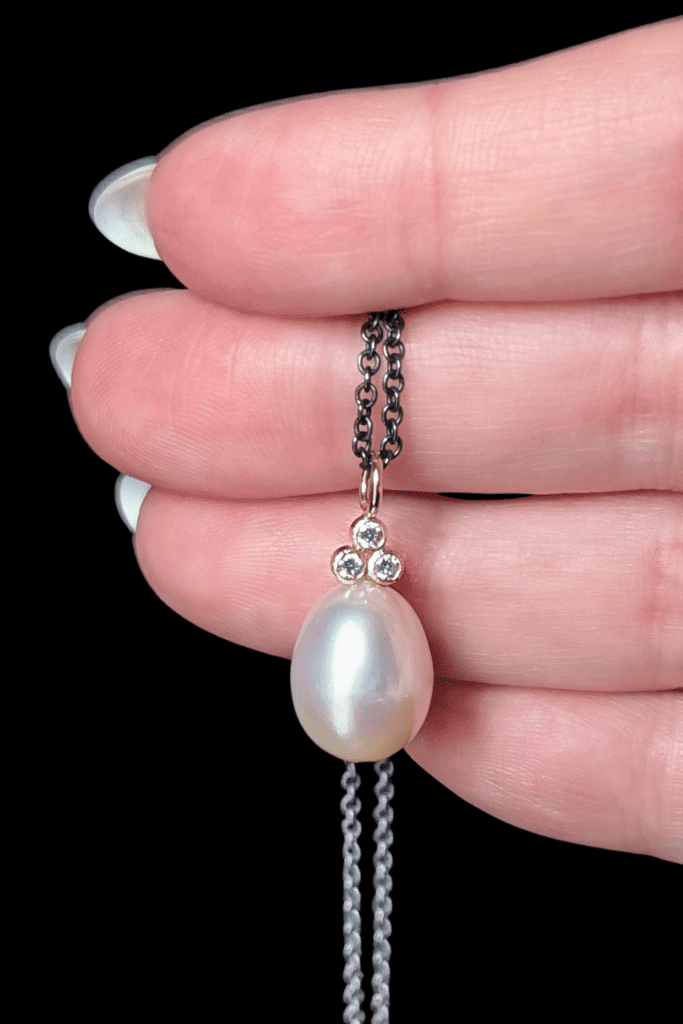 Karin Jacobson pearl pendant with recycled diamonds from Beaumont Jewelry Collective.