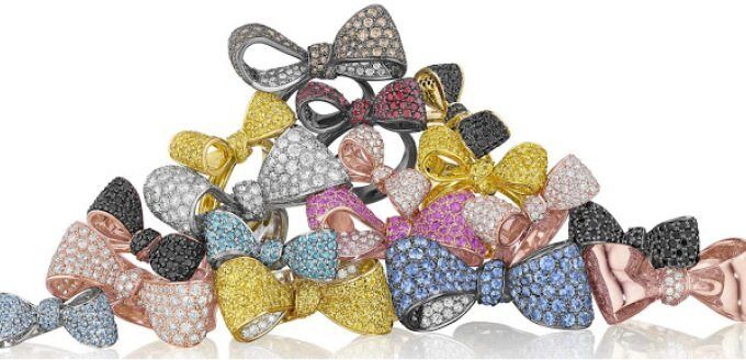 Gemstone and diamond bow rings by Mimi So. Via Diamonds in the Library.
