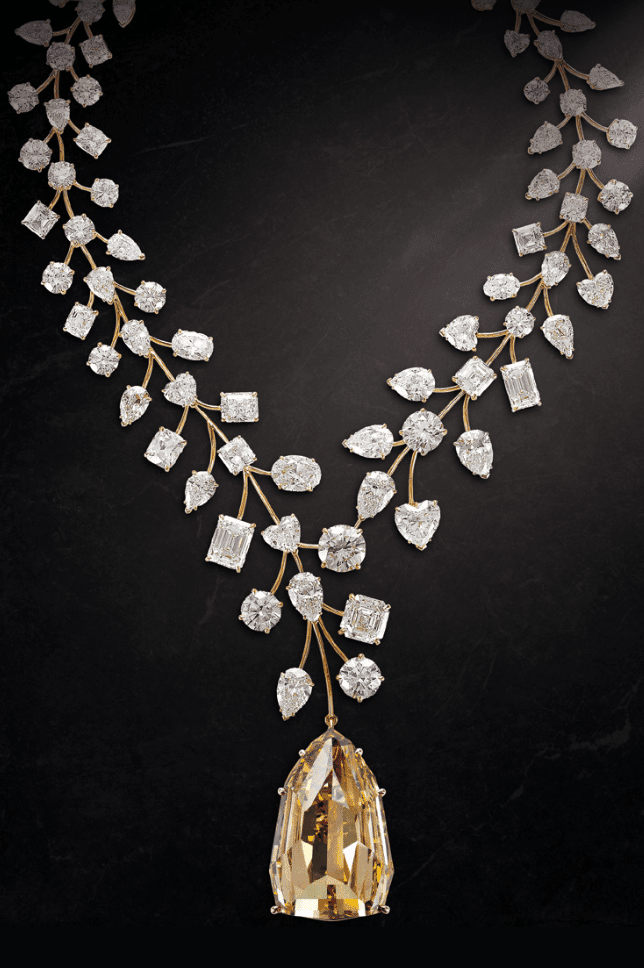 Mouawad's record-breaking L'Incomparable diamond necklace; a 407.48 carat, internally flawless natural fancy deep yellow diamond set with 637 carats of smaller diamonds.