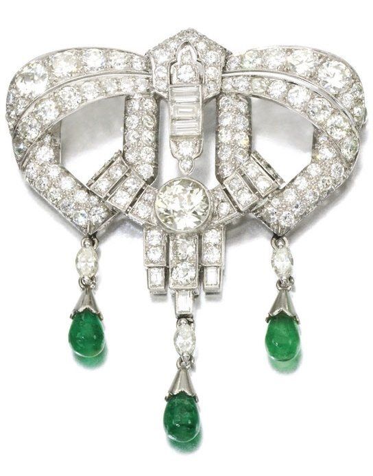 Art Deco emerald and diamond brooch, circa 1930's. Via Diamonds in the Library.
