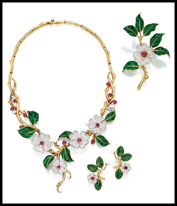 Gold, diamond, enamel, and ruby dogwood flower suite by Boucheron, Paris. Via Diamonds in the Library.