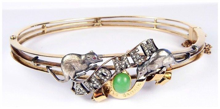 Antique Of Mice and Men bracelet with green jade, garnets, and rose-cut diamonds.