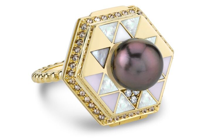 The Harwell Godfrey Vida Water poison ring! This ring has a secret. Inlaid with mother of pearl and other gems.