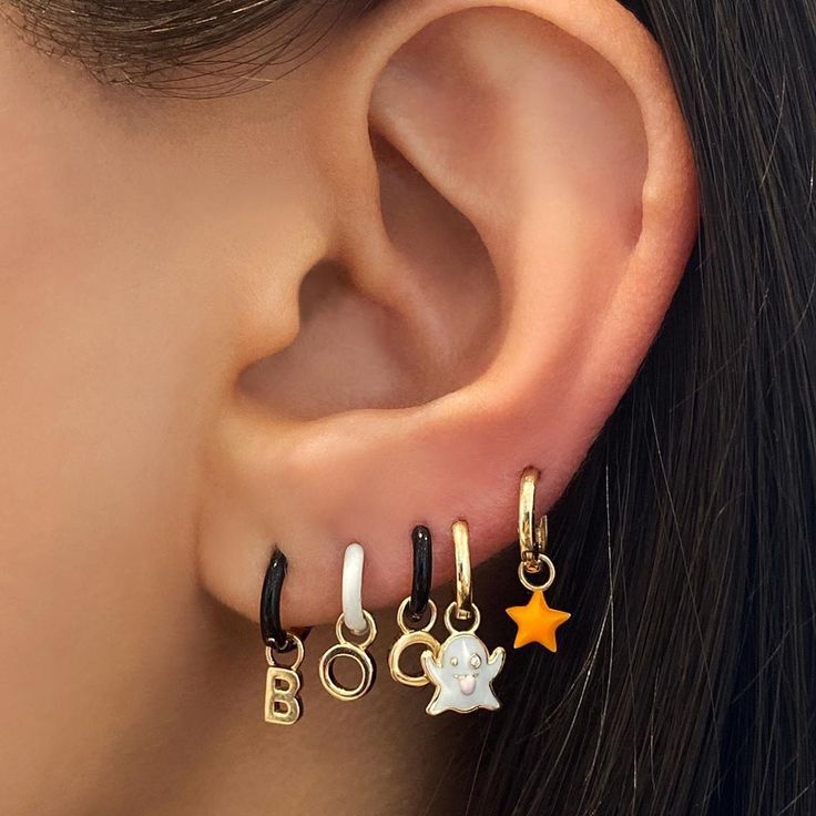 Perfect Halloween earrings by Alison Lou! The ghost glows in the dark.