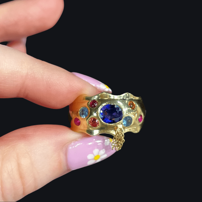 Gold and sapphire fringe ring with colored gems by Crevette Design Studio.