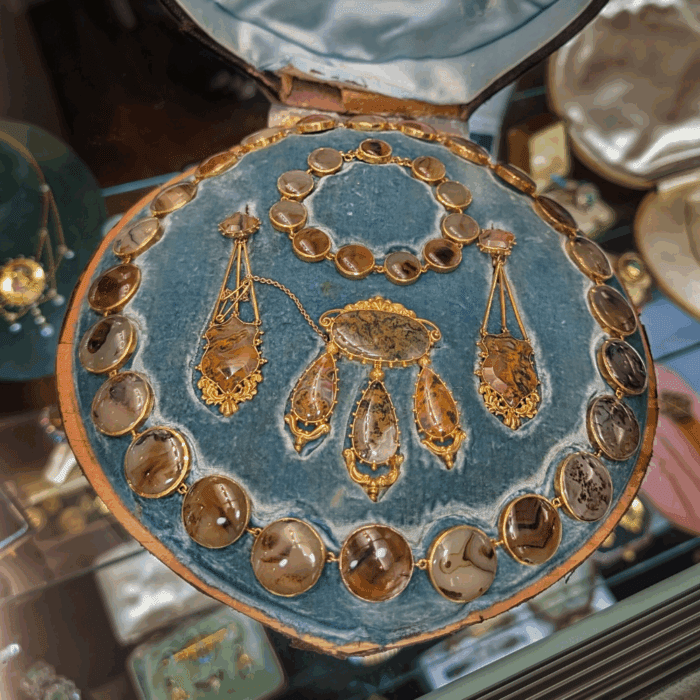 An exquisite antique Georgian parure with moss agate jewelry. From Antique Jewelry Expo.