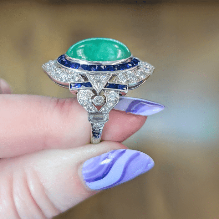 An extraordinary Art Deco jade, sapphire, and diamond ring from E & L Finery. Seen at NYCJAOS 2025.