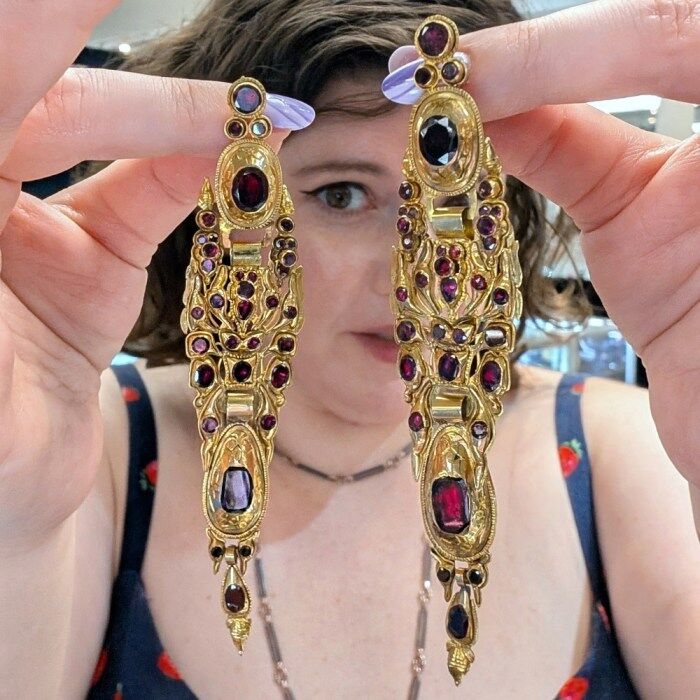Antique Iberian earrings with garnet, seen at Jane Fletcher during NYCJAOS Spring 2025.