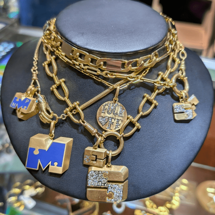 Chunky gold charms and pendants by Circa 1700.