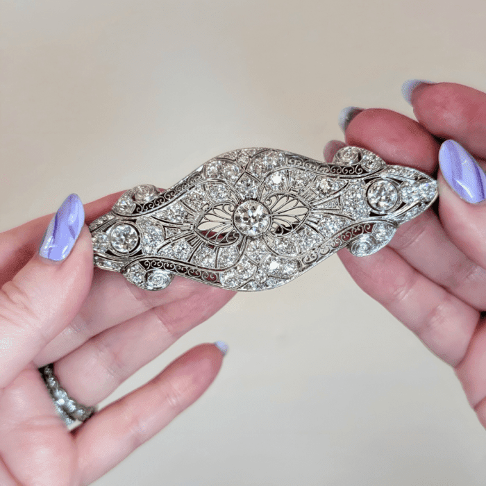 Extraordinary antique platinum and diamond brooch from Bluestone Trading. Seen at NYCJAOS Spring 2025.