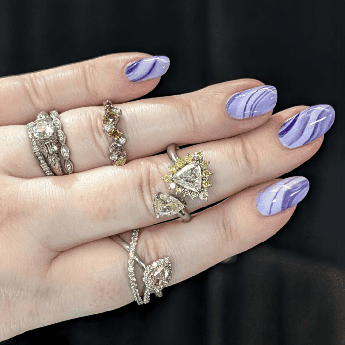 White and colored diamond rings by Ariis Jewelry, seen at NYCJAOS Spring 2025