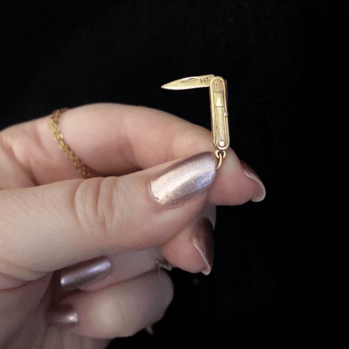 My tiny vintage gold knife charm reminds me that I am strong.