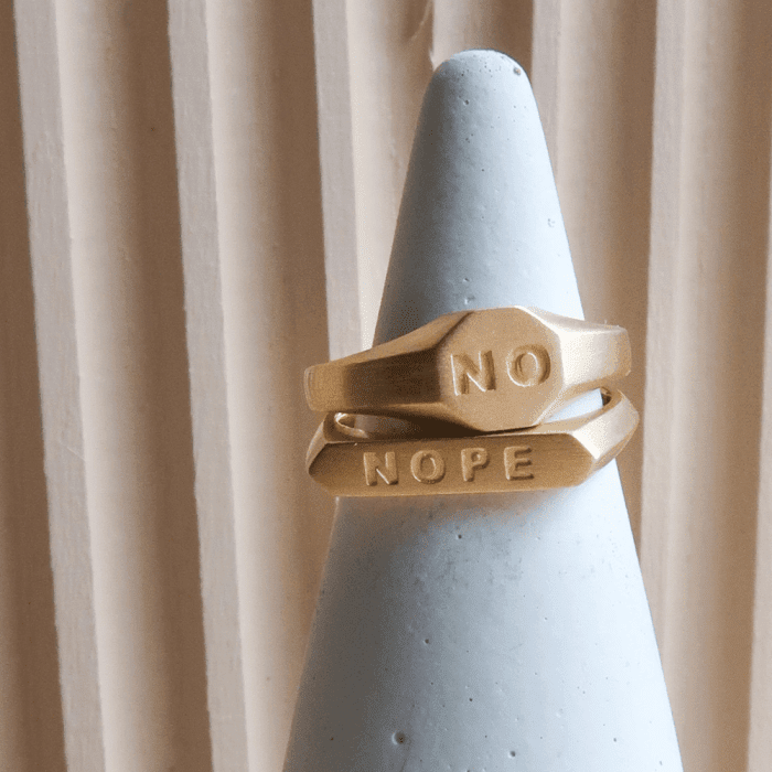 No ring and nope ring by Psyche Fine Jewelry.