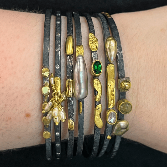 Oxidized sterling silver bangle bracelets by Deborah Meyers Experience with gold, diamonds, emerald, and pearls