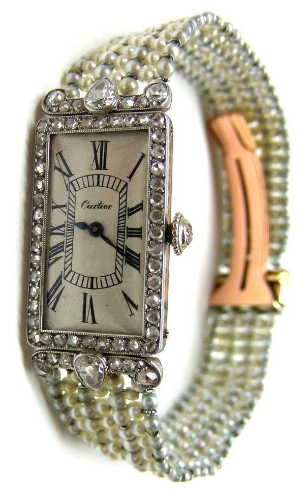 Cartier pearl and diamond dress watch, circa 1905. Via Diamonds in the Library.