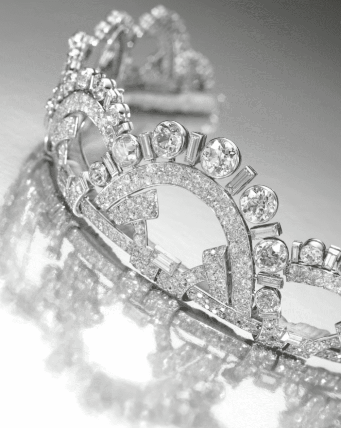 Alternate view; Art Deco tiara by Boucheron, circa 1937. Designed as a series of interlocking geometric arches, set with circular-, single-cut and baguette diamonds, in platinum.