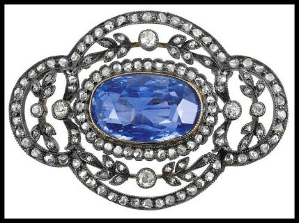 Antique Russian brooch in silver and gold with an 11.25 carats central sapphire within a design of old-mine & rose-cut diamonds. Via Diamonds in the Library.