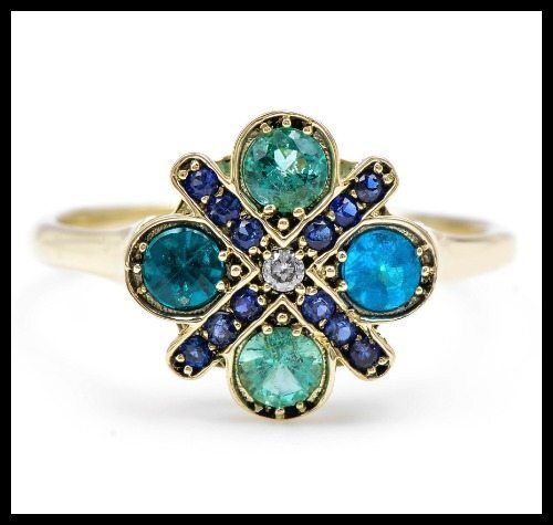 Large Paraiba Flower ring by Lori McLean with paraiba, sapphire, and diamond in 14k green gold.