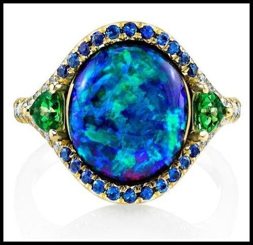 The award-winning Lighting Ridge black opal ring by Omi Privé, with diamonds, sapphires, and tsavorite garnet.