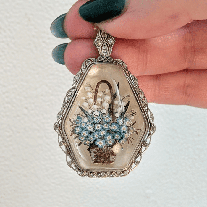An exquisite antique Essex crystal pendant with a basket of flowers. Seen at The Eden Collective during NYCJAOS Spring 2026.