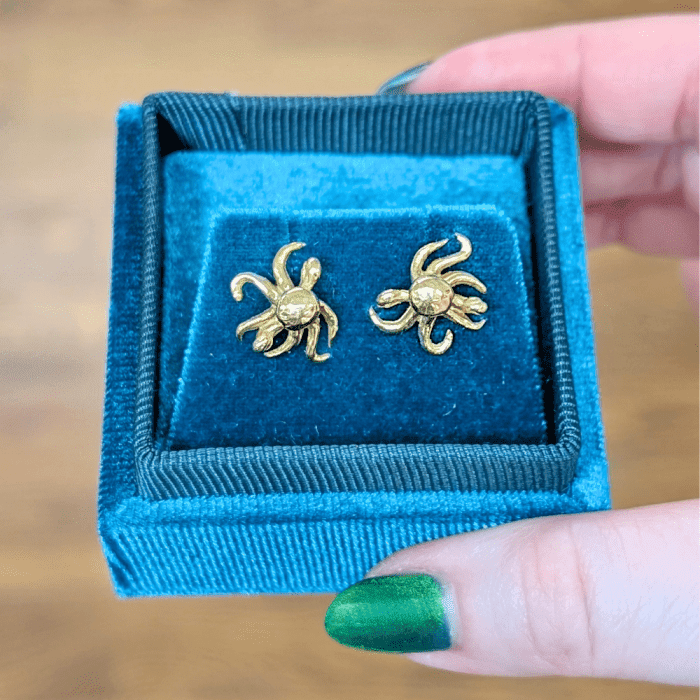 Gold octopus stud earrings by Delphine Leymarie, seen at NYCJAOS 2026.