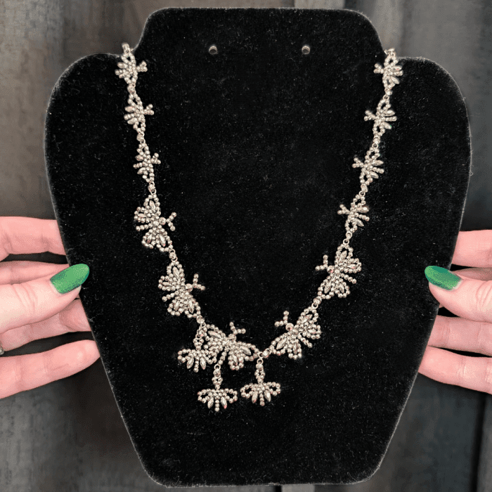 I love the buttefly motif of this antique cut steel necklace. Seen at Spare Room Antiques during NYCJAOS Spring 2026.