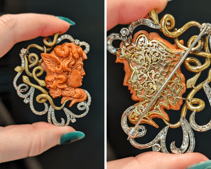 A stunning vintage Medusa brooch in gold, coral and diamonds; front and back view. Seen at Antique Jewelry Expo during NYCJAOS Spring 2026.