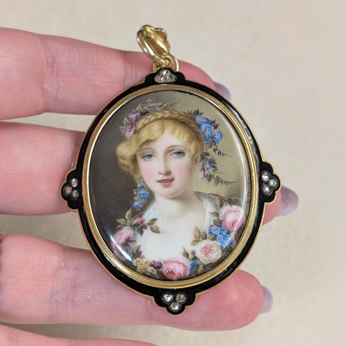 An utterly exquisite antique portrait miniature brooch pendant from Marilyn & Co. Seen at NYCJAOS Spring 2025.